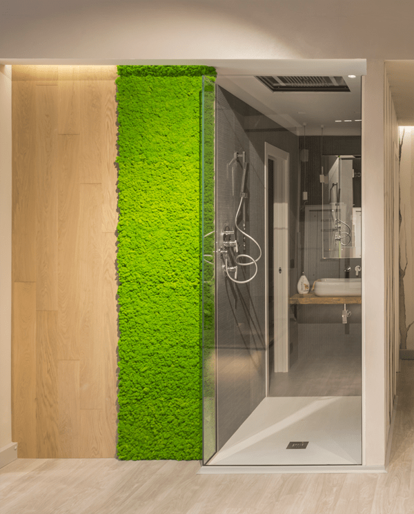 Reference image of Polarmoss Ltd. Green colored reindeer moss panels on the wall. Product: Polarmoss Flex Element